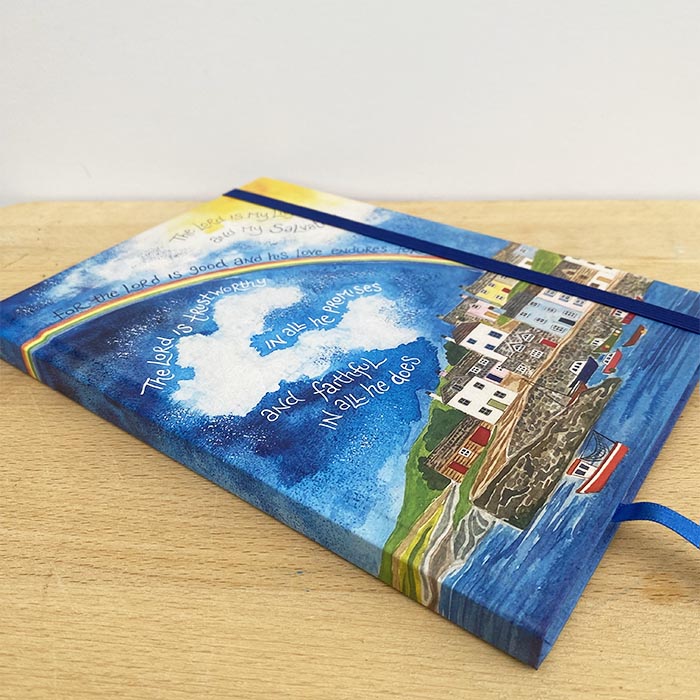Hannah Dunnett Light of the World hardback journal on desk image